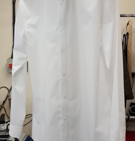 Dry cleaned crisp white shirt Dry cleaned crisp white shirt